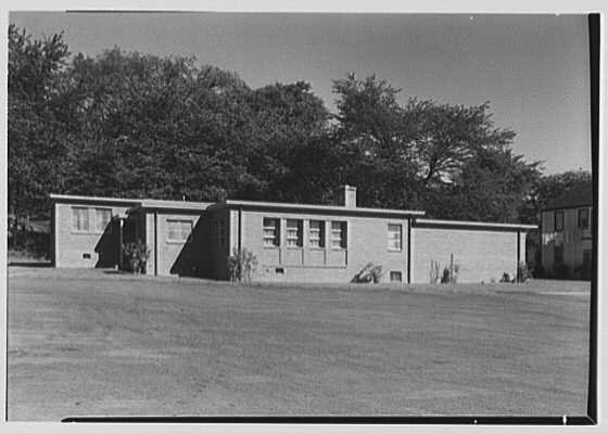 A country cottage among trees at Bedford Hills, New York, in a photograph from 1948.