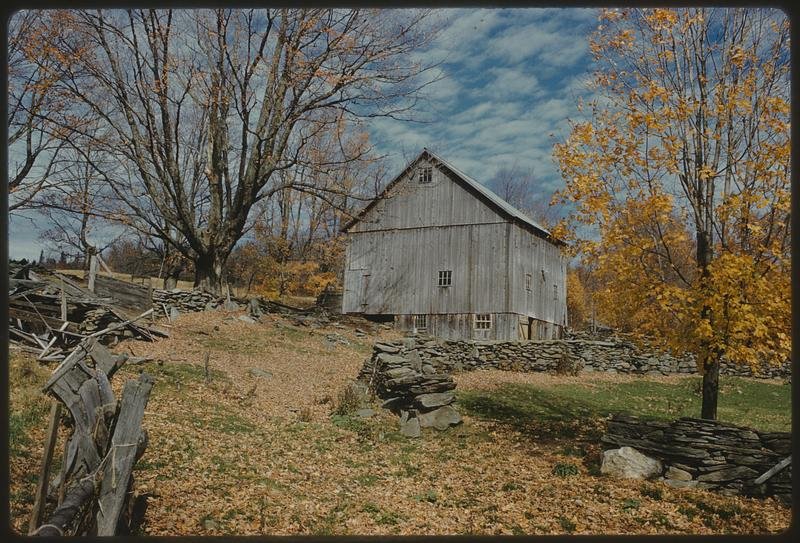 A red barn in the Vermont countryside, in a color slide.