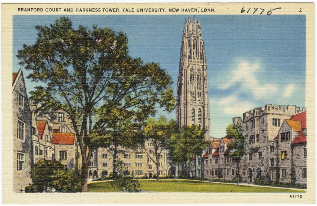 A color postcard of a stone courtyard at Yale University, with a tall Gothic tower beyond.