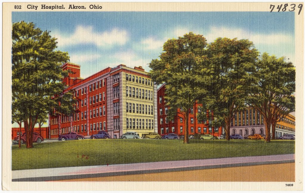 A linen postcard of City Hospital in Akron, a large brick hospital building.