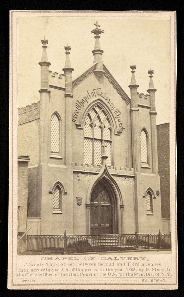 An old photograph of a small church building on a city street.