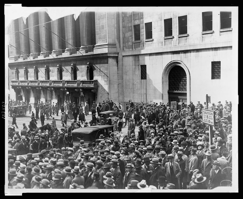 A large crowd gathered in the street outside the New York Stock Exchange after the crash of 1929.